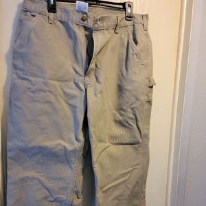 Men's carhartt pants tags says 36 × 30.